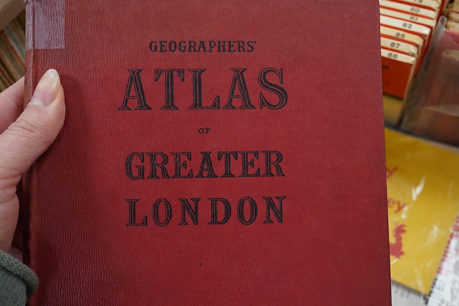 A collection of Ordnance Survey maps, including some early examples laid on canvas, a few ordinance survey related books and guides, an engraved Roman map of Britain dated 1821, and a few other maps. Condition - fair to